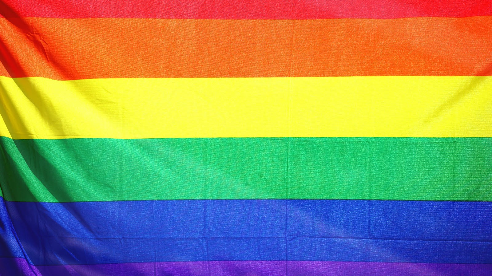 The Complete History Behind the Pride Flag Colors
