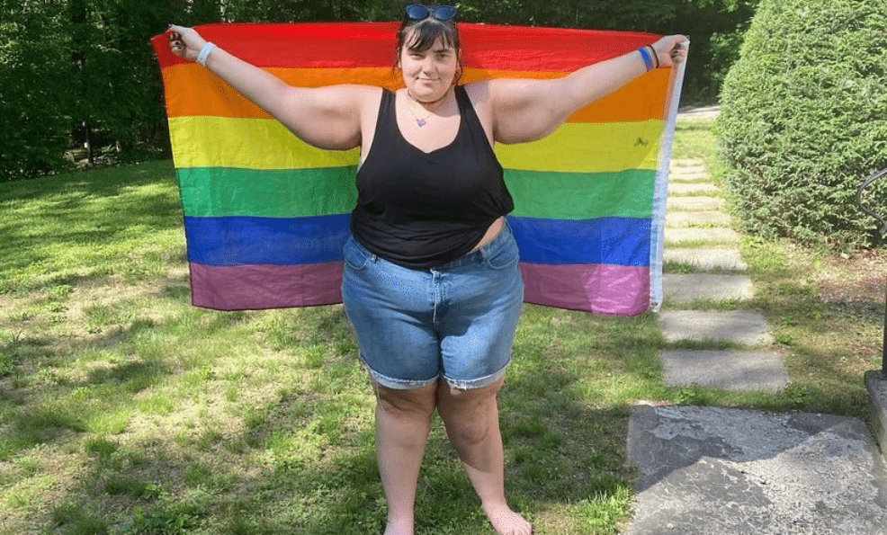 Customer photo with the LGBTQ+ Pride Flag